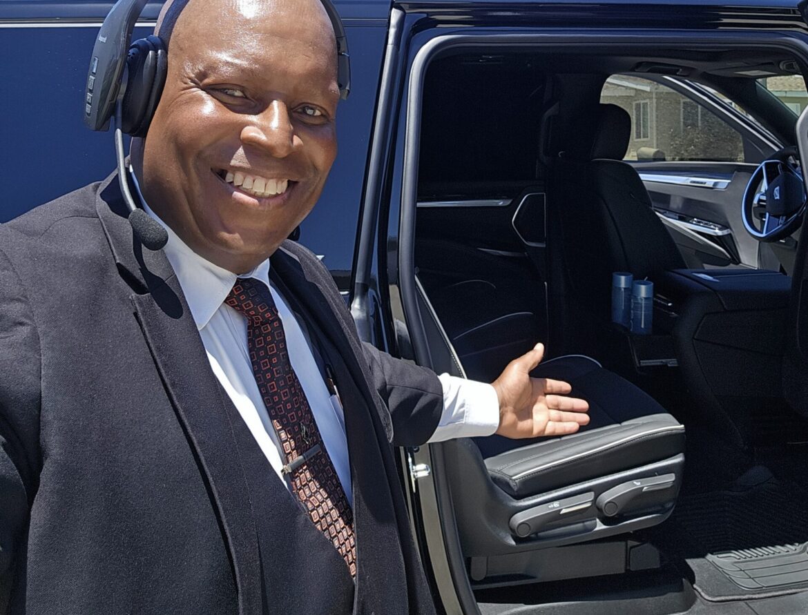 Patrick W. Paige providing personalized glendora airport car service featuring a luxury black Cadillac Escalade ESV.