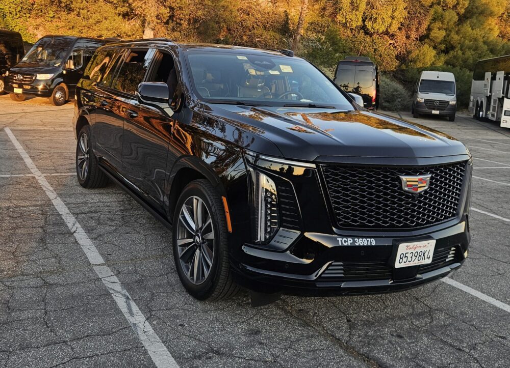 Luxury Black Cadillac Escalade providing professional Glendora to LAX airport car service with private chauffeur